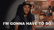 a woman wearing a hat that says challenge accepted