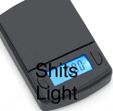 a digital scale that says shits light on the bottom