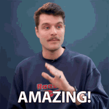 a man wearing a blue reebok sweatshirt says " amazing "