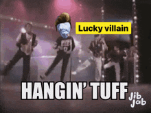 a picture of a group of people dancing with the words lucky villain hanging tuff below them