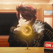 a man with a crown on his head is sitting at a table with a sign that says on