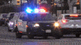 a ford police car with a license plate that says nmv-072