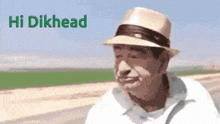 a man wearing a hat with the words hi dikhead on the bottom