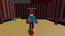 a person in a blue jacket is standing on a beach ball in a room with the duel manuwu written on the bottom