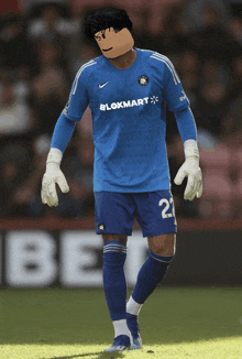 a soccer player wearing a blue shirt with the word bloxmart on it