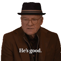 a man wearing a hat and glasses says " he 's good "