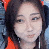 a close up of a woman 's face with a screen that says dreamhack