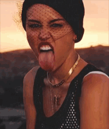 Miley Cyrus Tongue Out GIF - Miley Cyrus Tongue Out Sticking Tongue Out GIFs