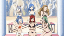 a group of women in bikinis sit on a bench