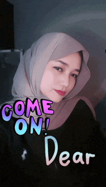 a woman wearing a hijab has the words come on dear written on her face
