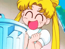 a girl is holding a trash can with her tongue out