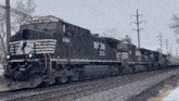 a black and white train with the number 4846 on the front