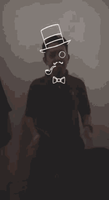 a man with a top hat and a bow tie