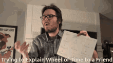 man carrying thing wheel of time wheel of time book explaining wheel of time convoluted