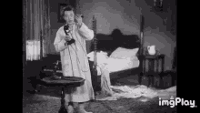 Laurel And Hardy Helpmates GIF - Laurel And Hardy Helpmates On The Phone GIFs