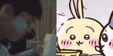 a man wearing a mask next to a cartoon drawing of a rabbit