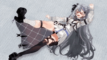 a girl with long hair is laying on the floor