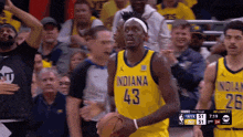 a basketball player wearing a jersey that says indiana