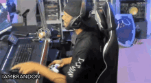 a man playing a video game with the name iambrandon on the bottom right
