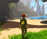 a man with a backpack walking on a beach
