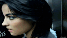 a close up of a woman 's face with the words editsmalte visible