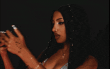 a woman with a tattoo on her wrist that says ' i love you '