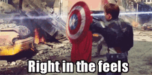 a man is holding a shield with the words right in the feels below it