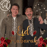 two men are posing for a picture with the words eid mubarak on the bottom