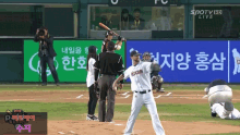 a baseball player wearing a bears jersey stands on the mound