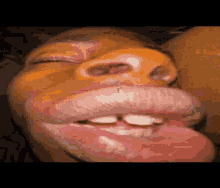 a close up of a person 's face with a piercing in their nose