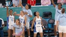 a group of female basketball players with france on their jerseys