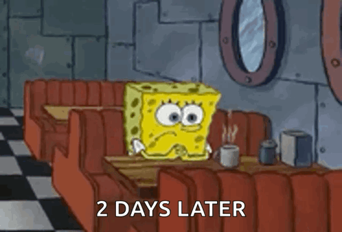 spongebob squarepants sits in a diner with a cup of coffee. He looks sad. "2 days later"