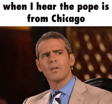 a man in a suit and tie with the caption when i hear the pope is from chicago on top