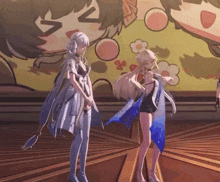 two anime girls are standing next to each other in front of a cartoon drawing of a girl with the letter v on her face