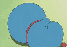a blue cartoon character with a red ribbon around his waist