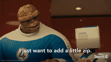 a movie poster for fantastic four shows the thing and a robot