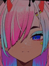 a close up of a girl 's face with pink and blue hair