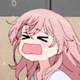 a girl with pink hair is making a funny face .