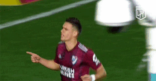 a soccer player wearing a jersey that says uruguay airlines