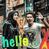 a man and a woman are standing next to each other and the word hello is written in green