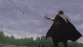 a man in a cape is holding a sword in his hand