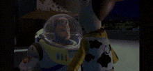 buzz lightyear and woody from toy story are talking to each other
