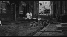 a black and white cartoon scene with a car parked in front of a store that says copette