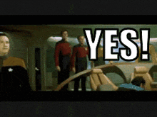 a blurred image of two men standing next to each other with the words yes written above them