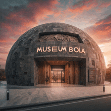 a large dome shaped building that says museum bola on the top