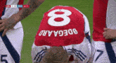 a soccer player with the number 8 on his jersey