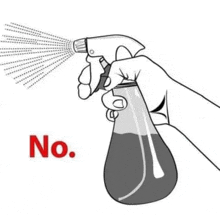 a hand is holding a spray bottle with the word no written on the bottom .