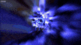 a blue and black background with the bbc logo on the bottom