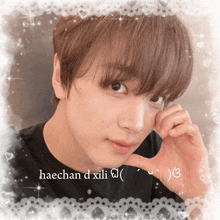 a picture of a young man with the words haechan d xili written on it