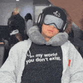 a person wearing a shirt that says in my world you don t exist